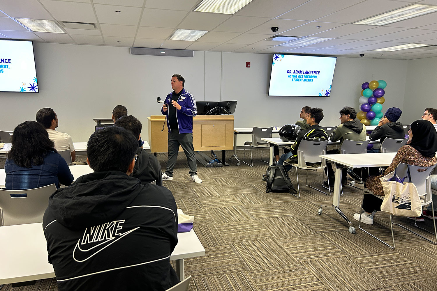 Dean of Students delivers address to class