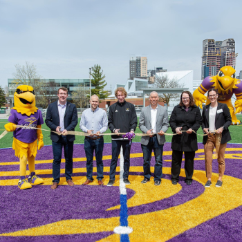Simon Chan with Laurier leaders including President and Vice-Chancellor, Deborah MacLatchy at the Alumni Field grand re-opening